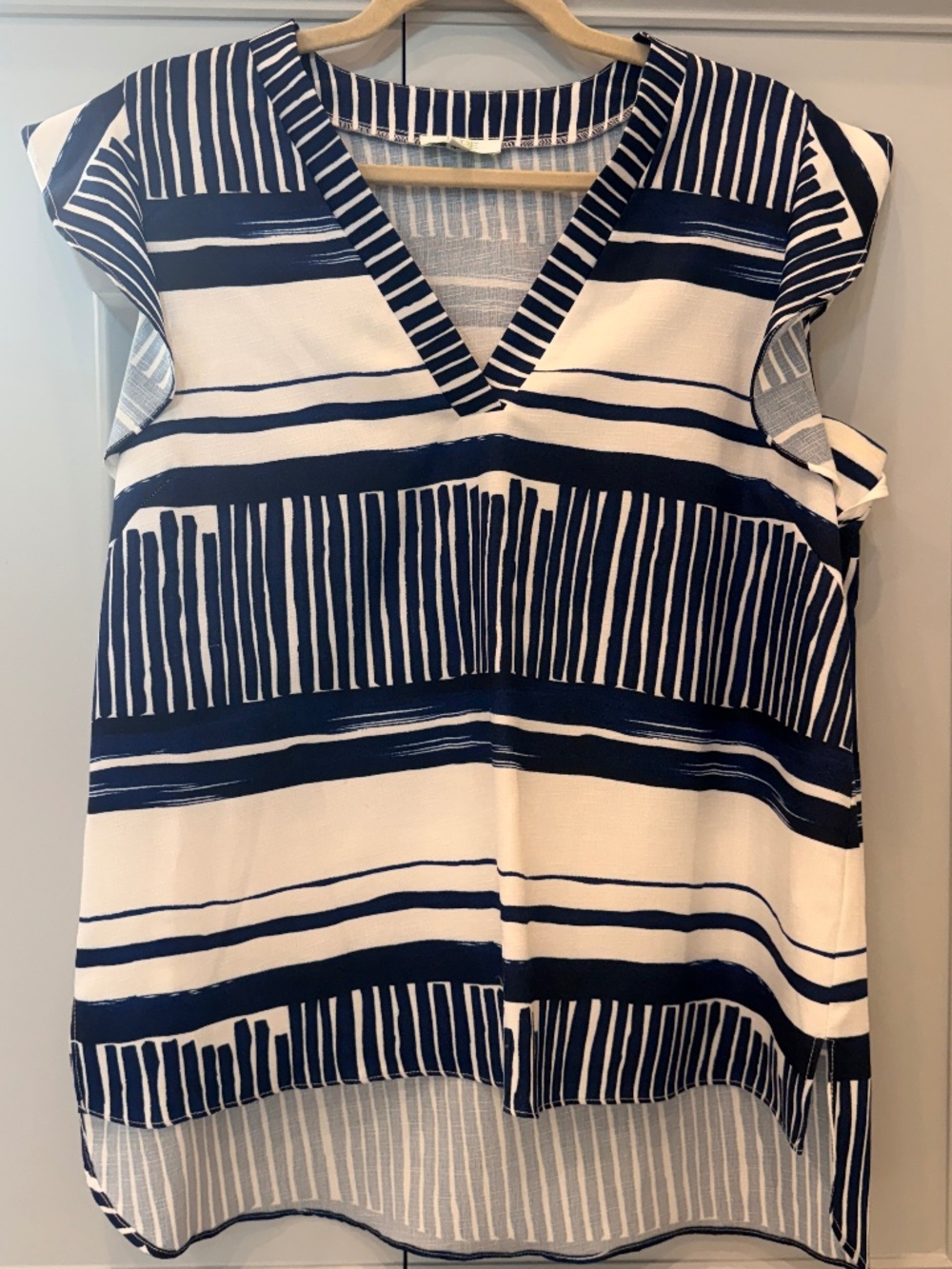 Fun v-neck blouse with ruffle cap sleeves